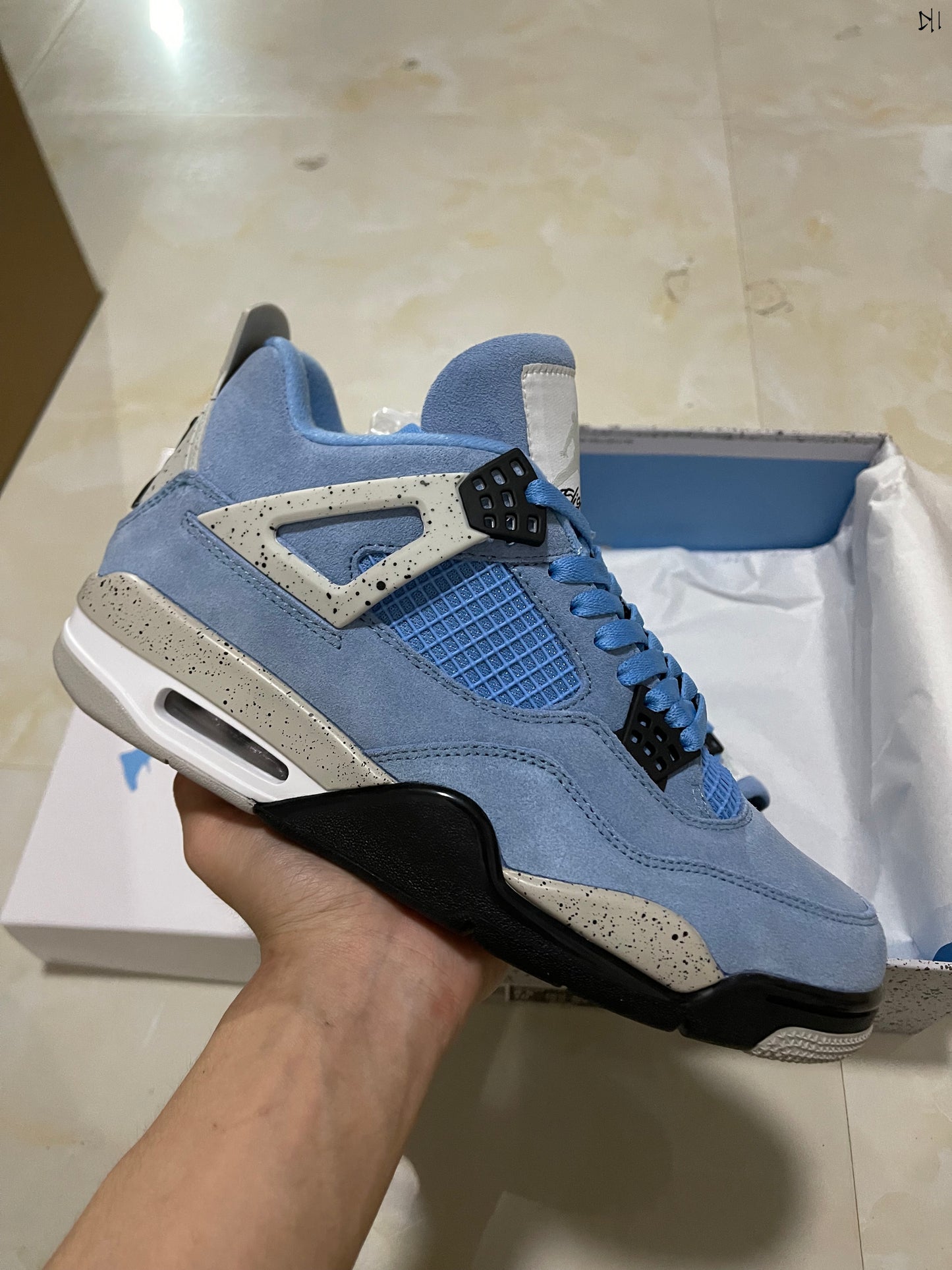 Jordan 4 retro University Blue