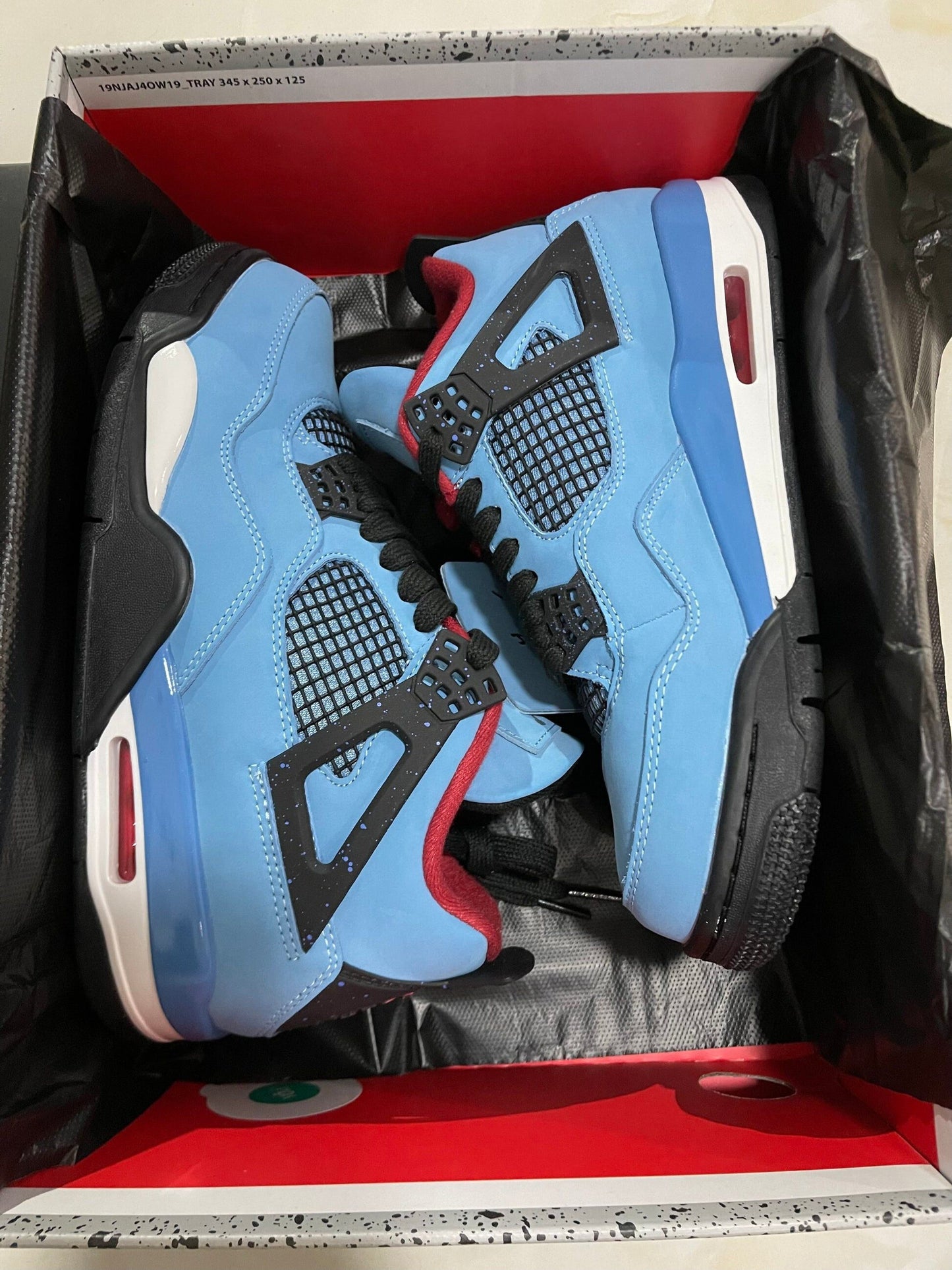 Air Jordan 4 Retro X Travis Scott