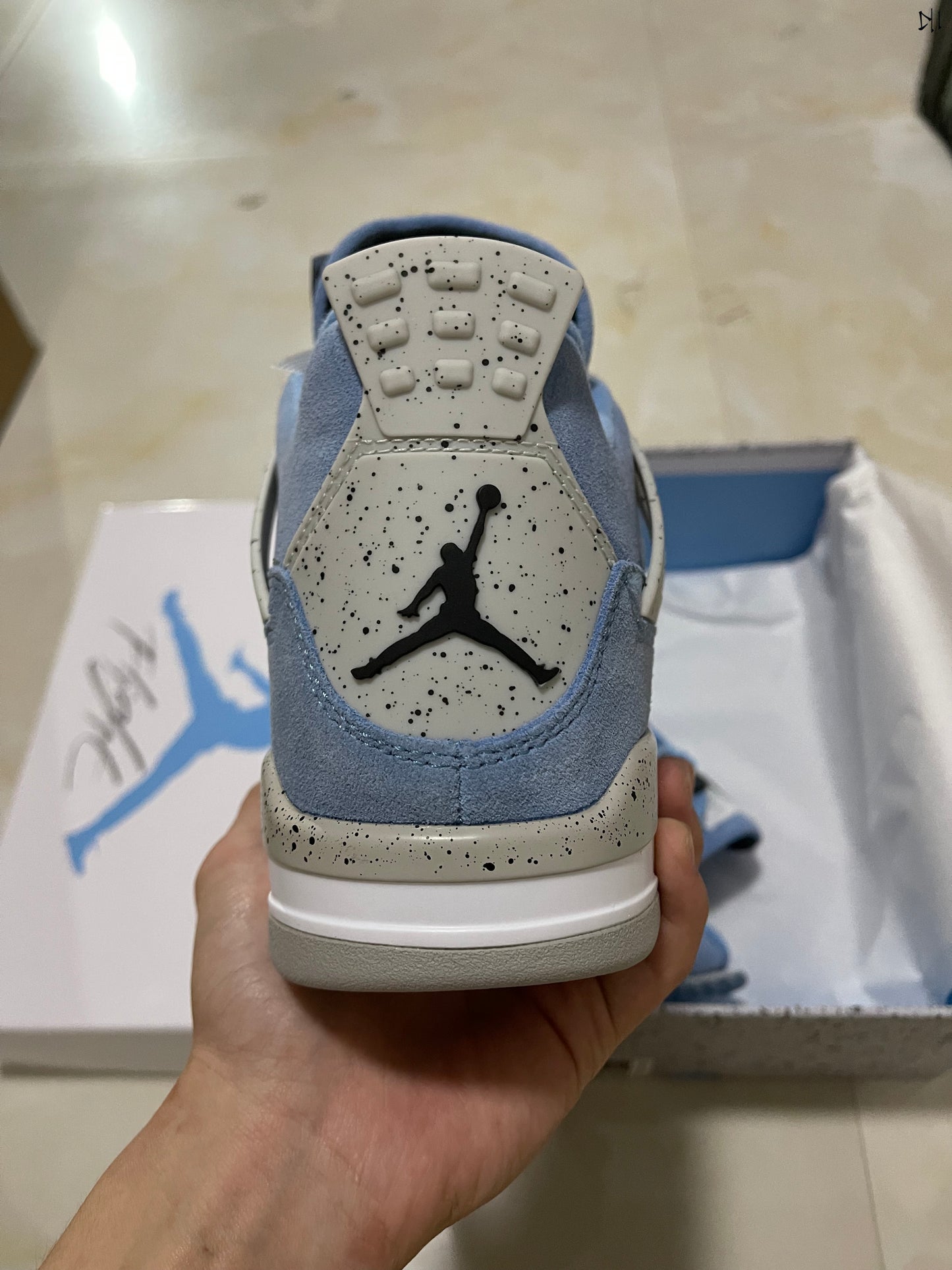 Jordan 4 retro University Blue