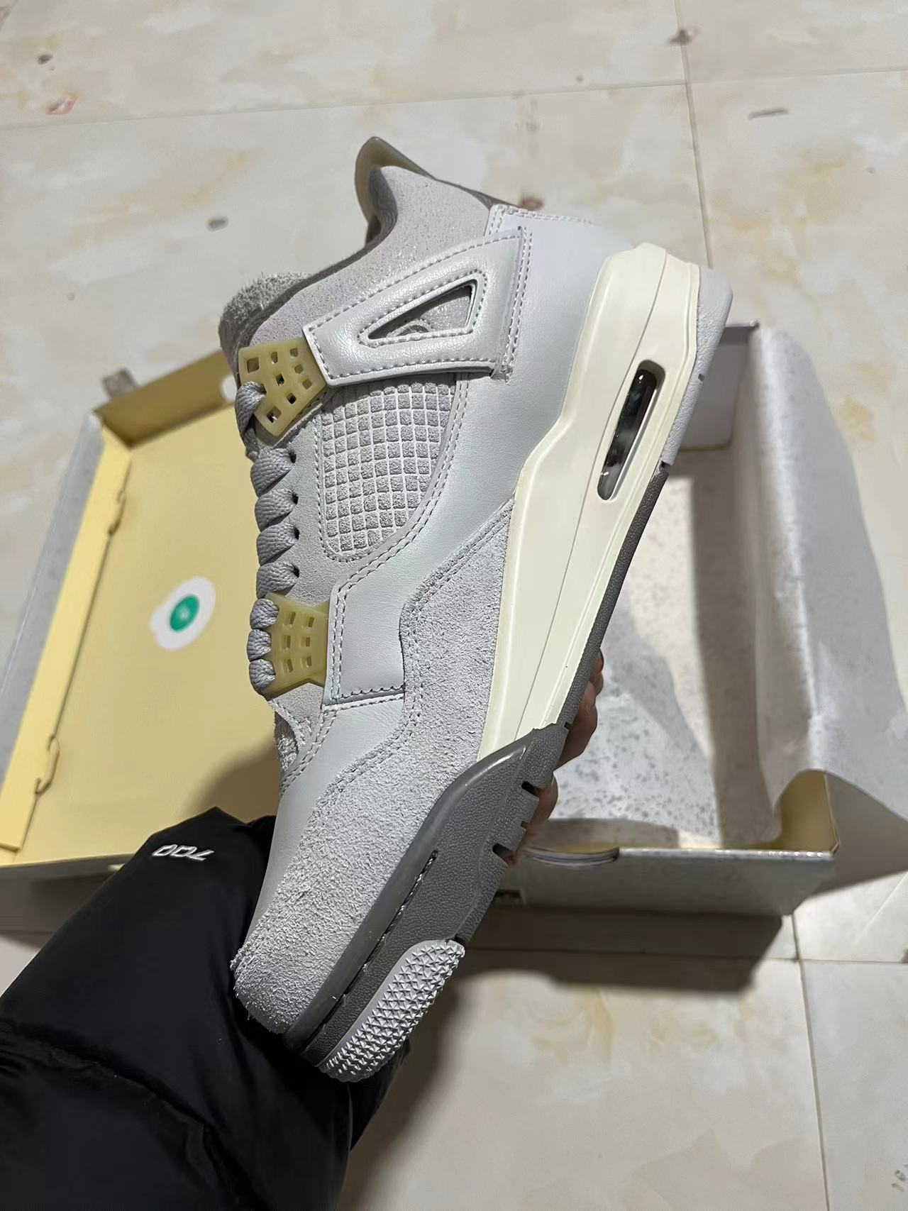 Jordan 4 Retro Craft Photon Dust
