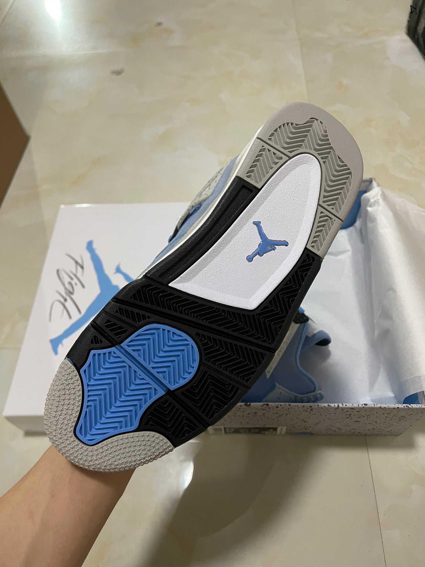 Jordan 4 retro University Blue