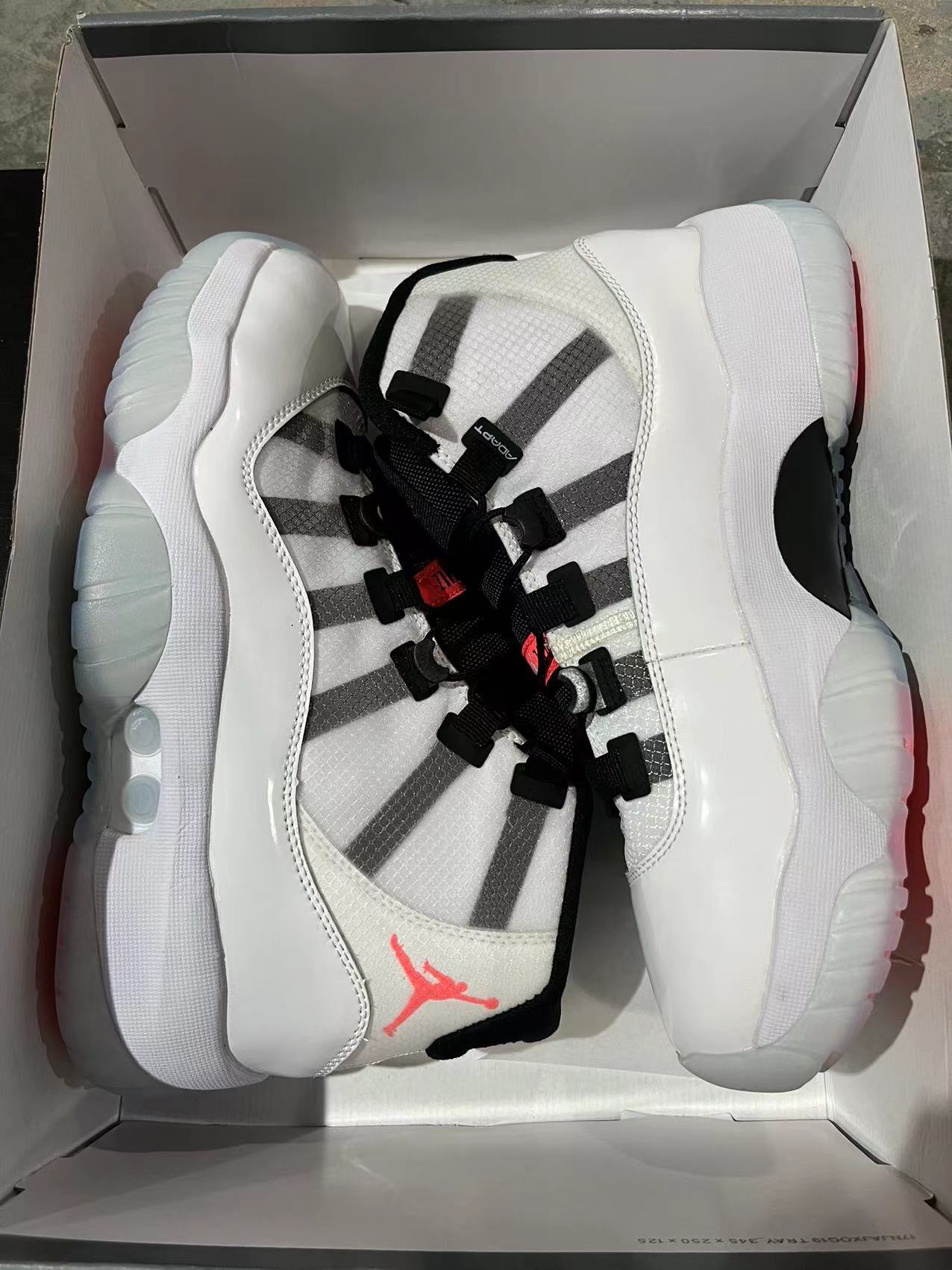 Jordan 11 Adapt black, white and red