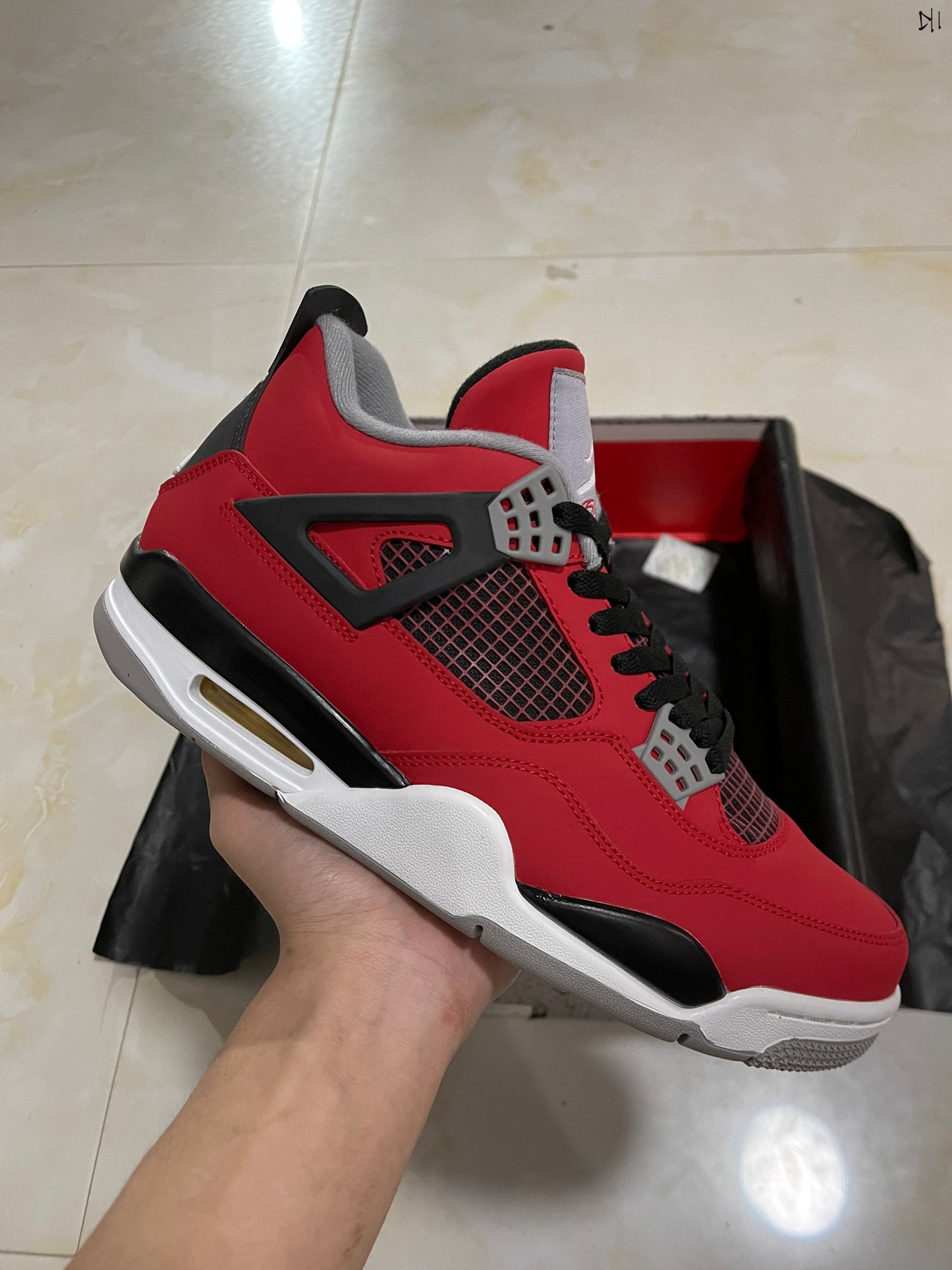 Jordan 4 Retro Toro Bravo