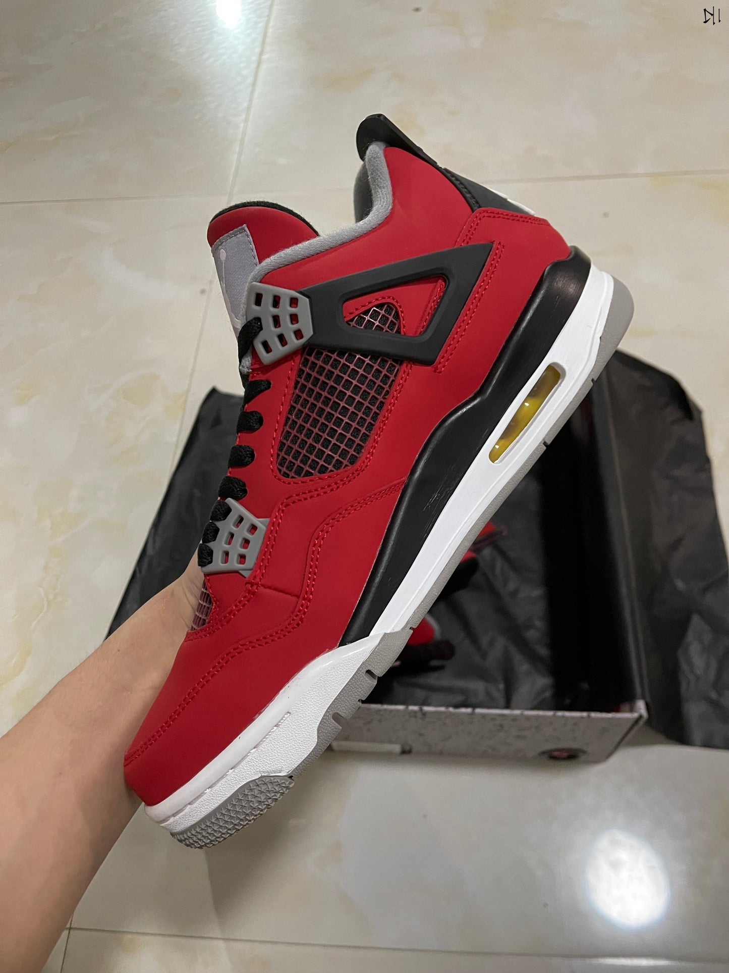 Jordan 4 Retro Toro Bravo