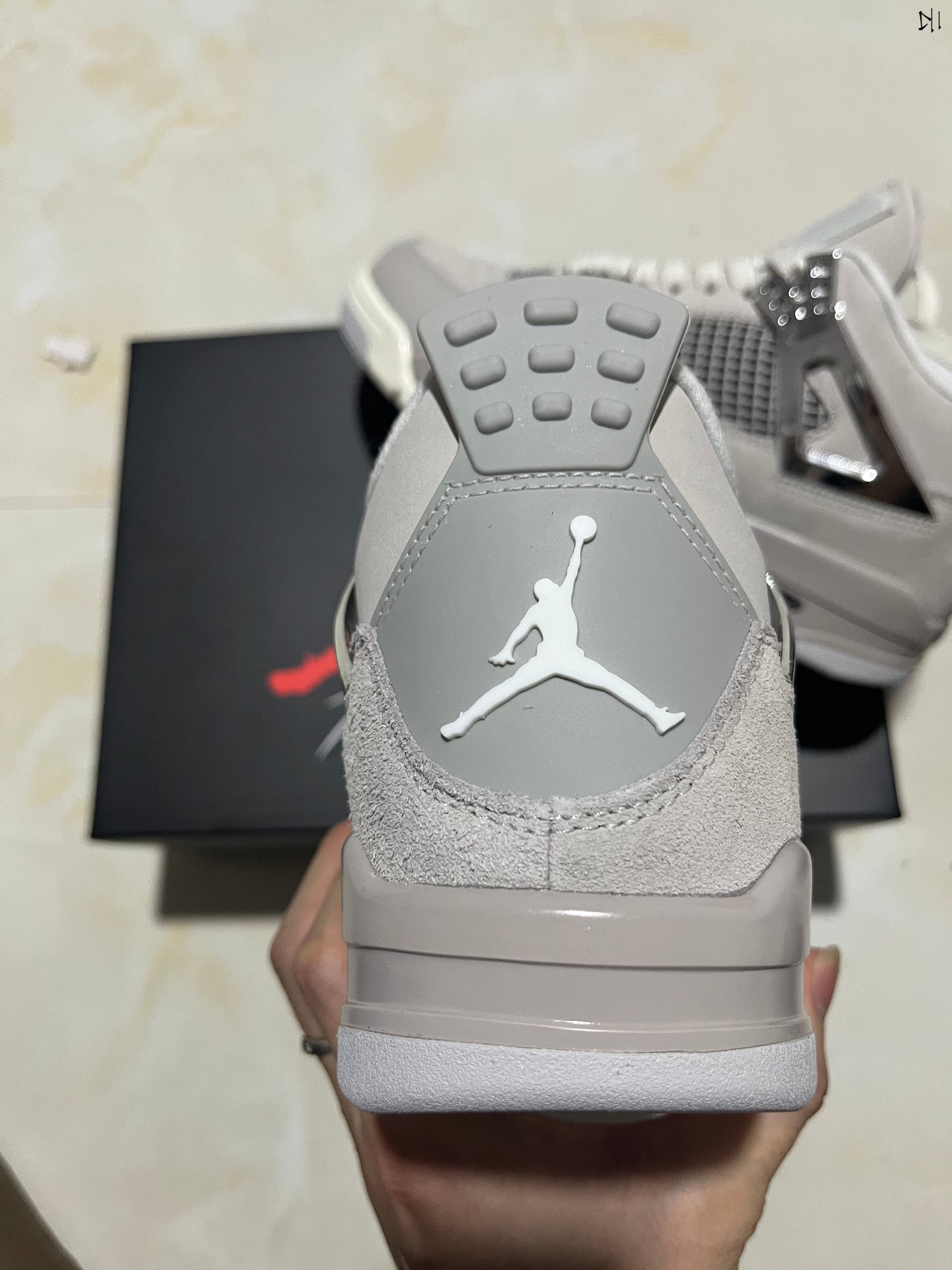 Jordan 4 Frozen Moments