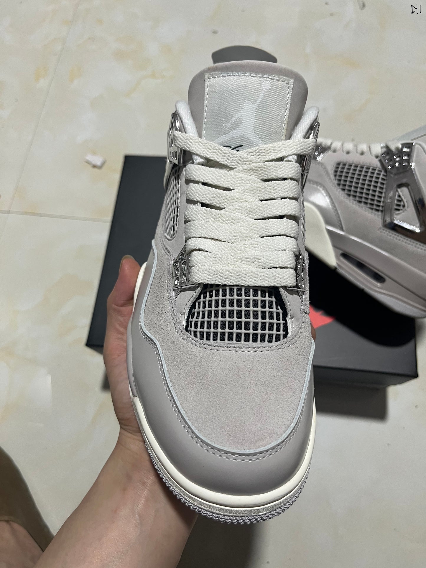 Jordan 4 Frozen Moments