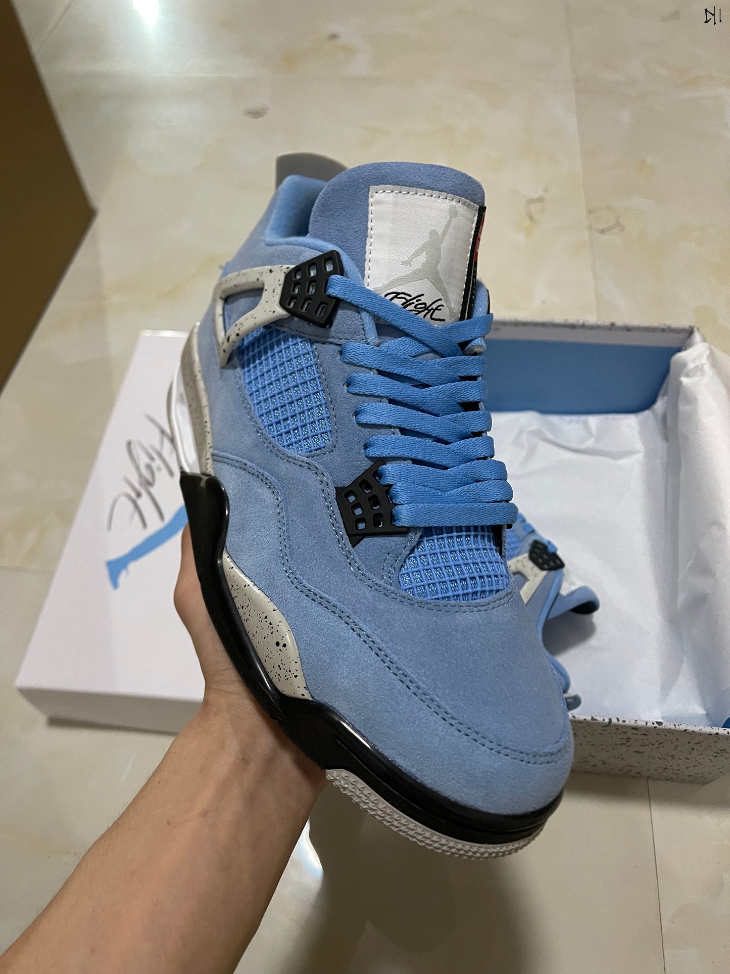 Jordan 4 retro University Blue