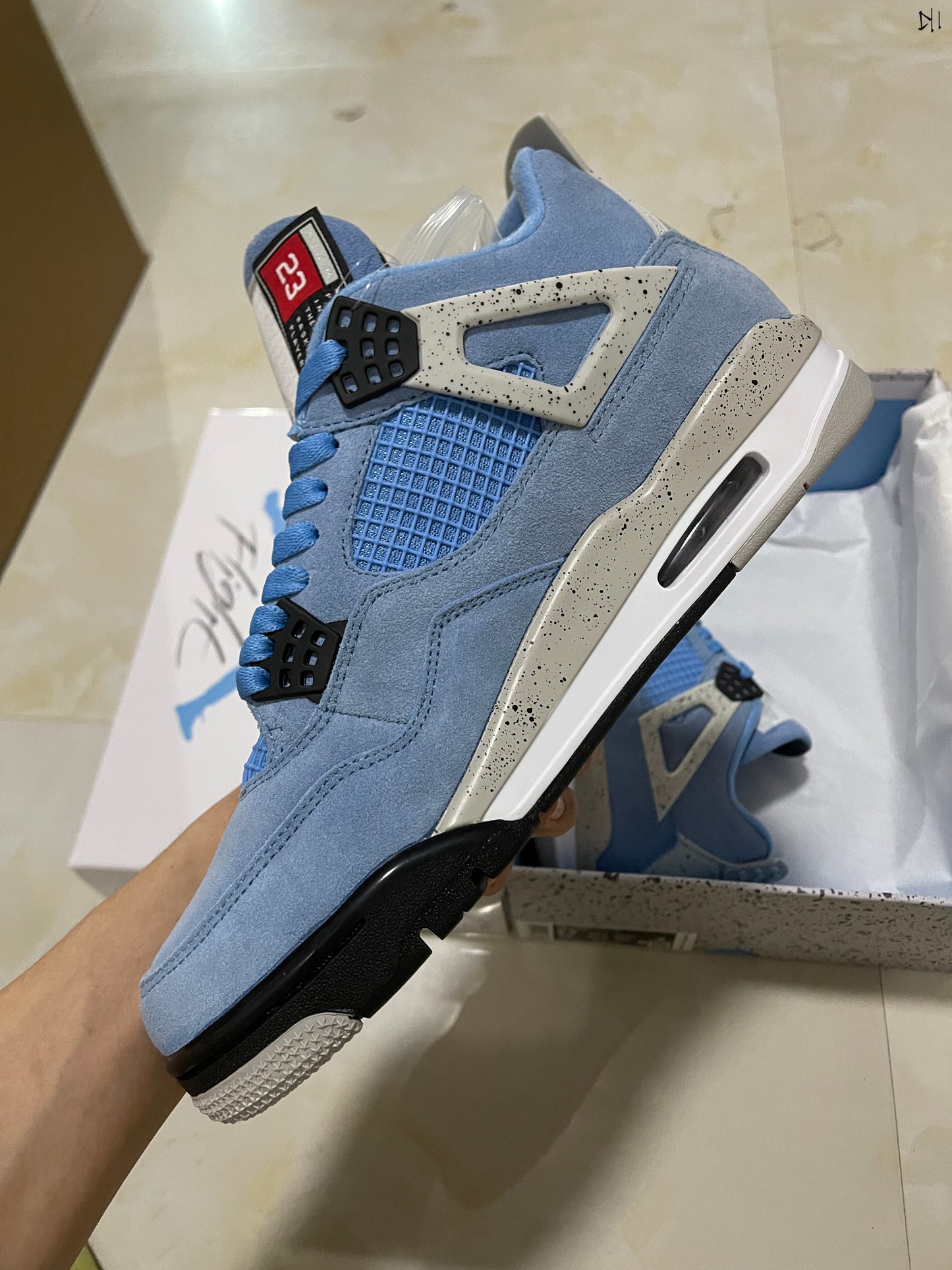 Jordan 4 retro University Blue