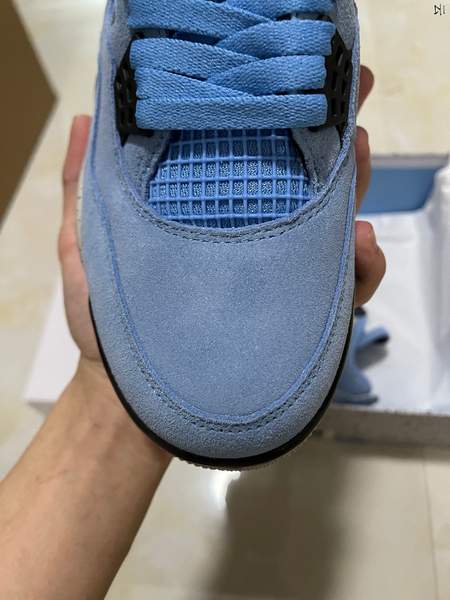 Jordan 4 retro University Blue