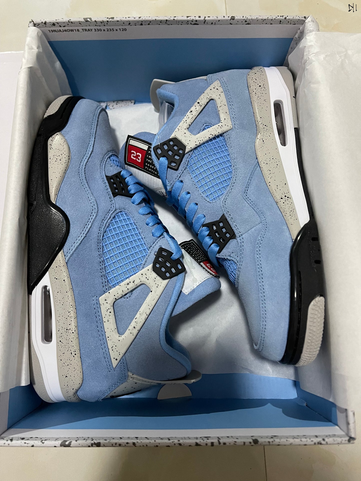 Jordan 4 retro University Blue